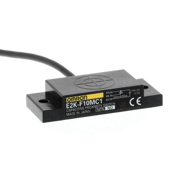 Proximity sensor, capacitive, flat, unshielded, 10mm, DC, 3-wire, NPN- E2KF1001A image 2
